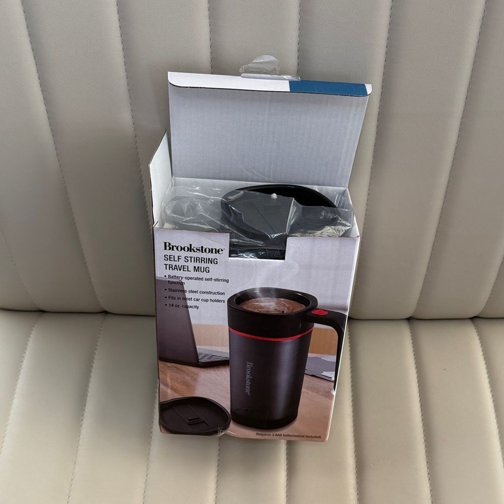 Brookstone Black and Red Self-Stirring Mug